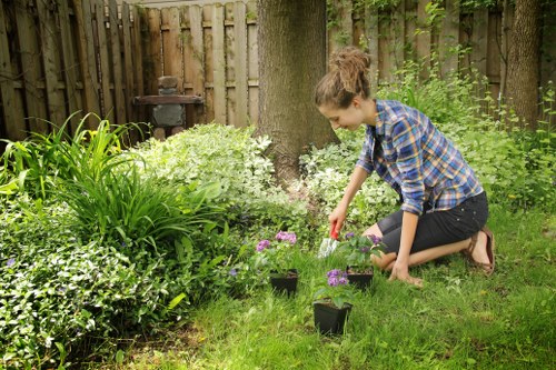 Team managing weather-related safety during landscaping